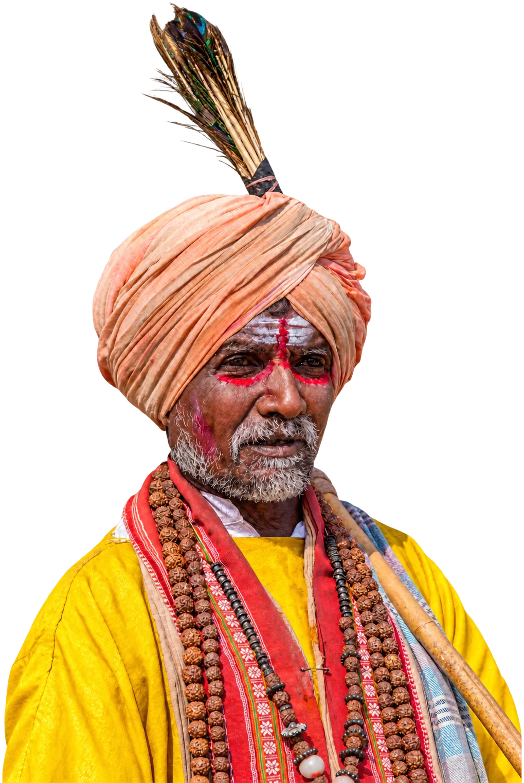 A pilgrim in a feathered turban, face painted, rudraksha beads at his neck, Hampi
