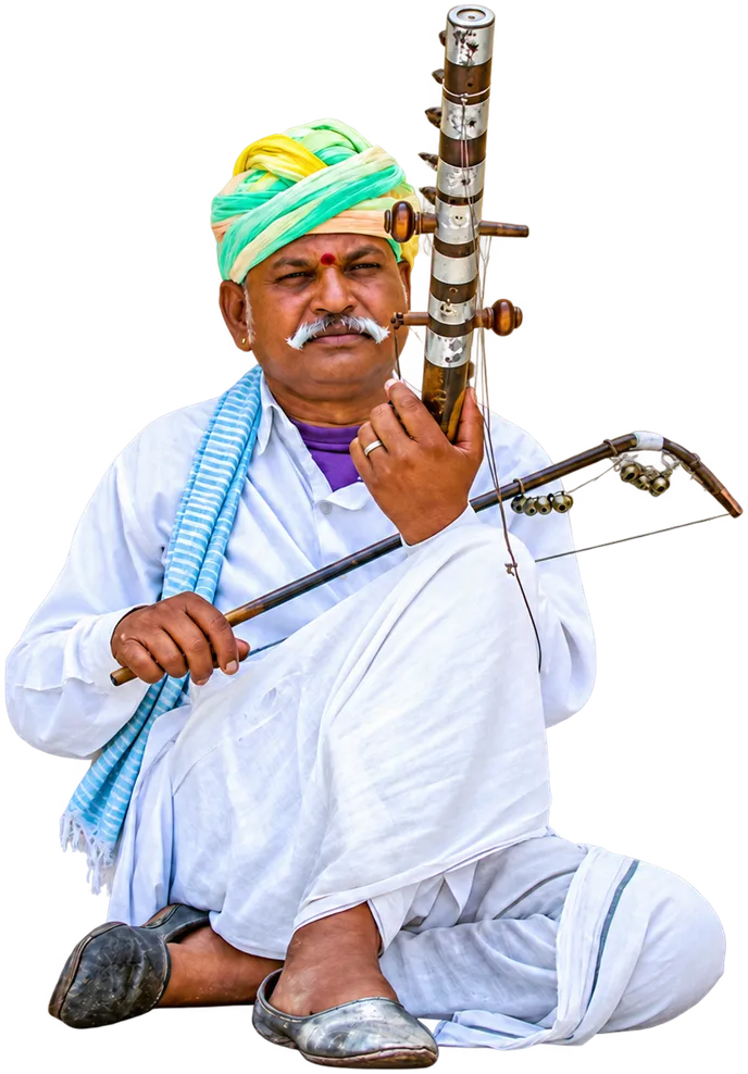 A musician in a green turban playing the ravanahatha