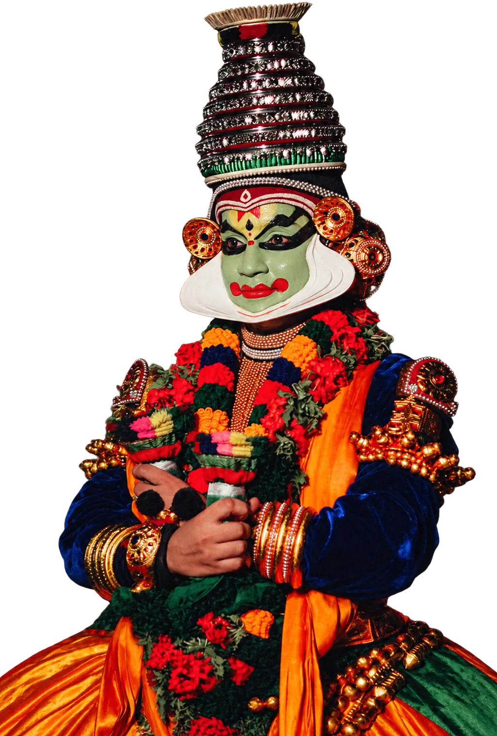 A Kathakali dancer in full make-up and crown