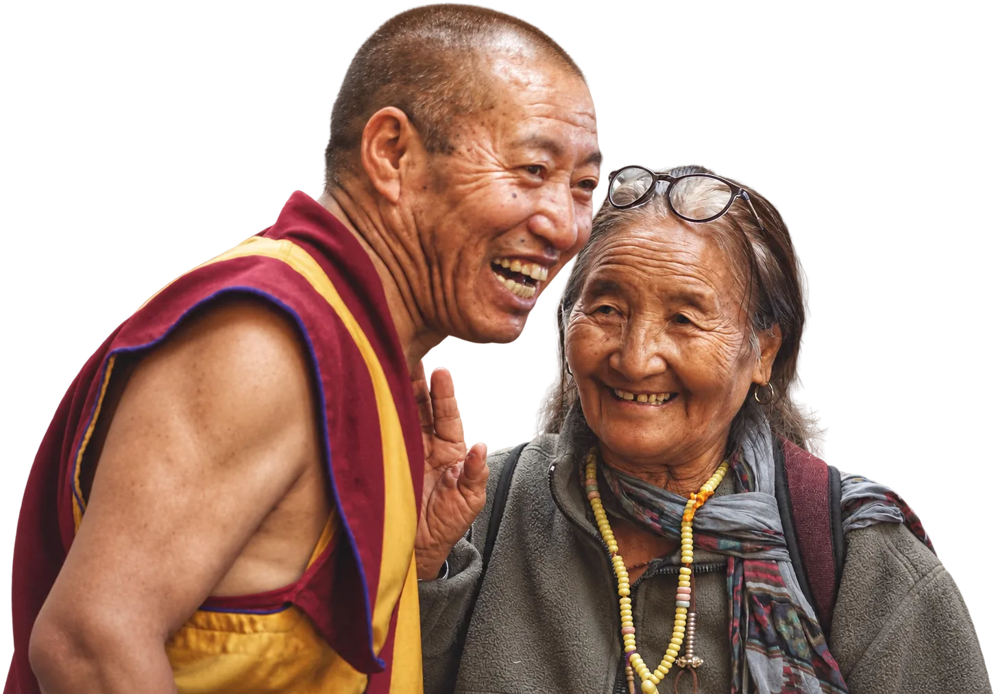 A Tibetan monk and an elderly woman laughing together, Dharamshala