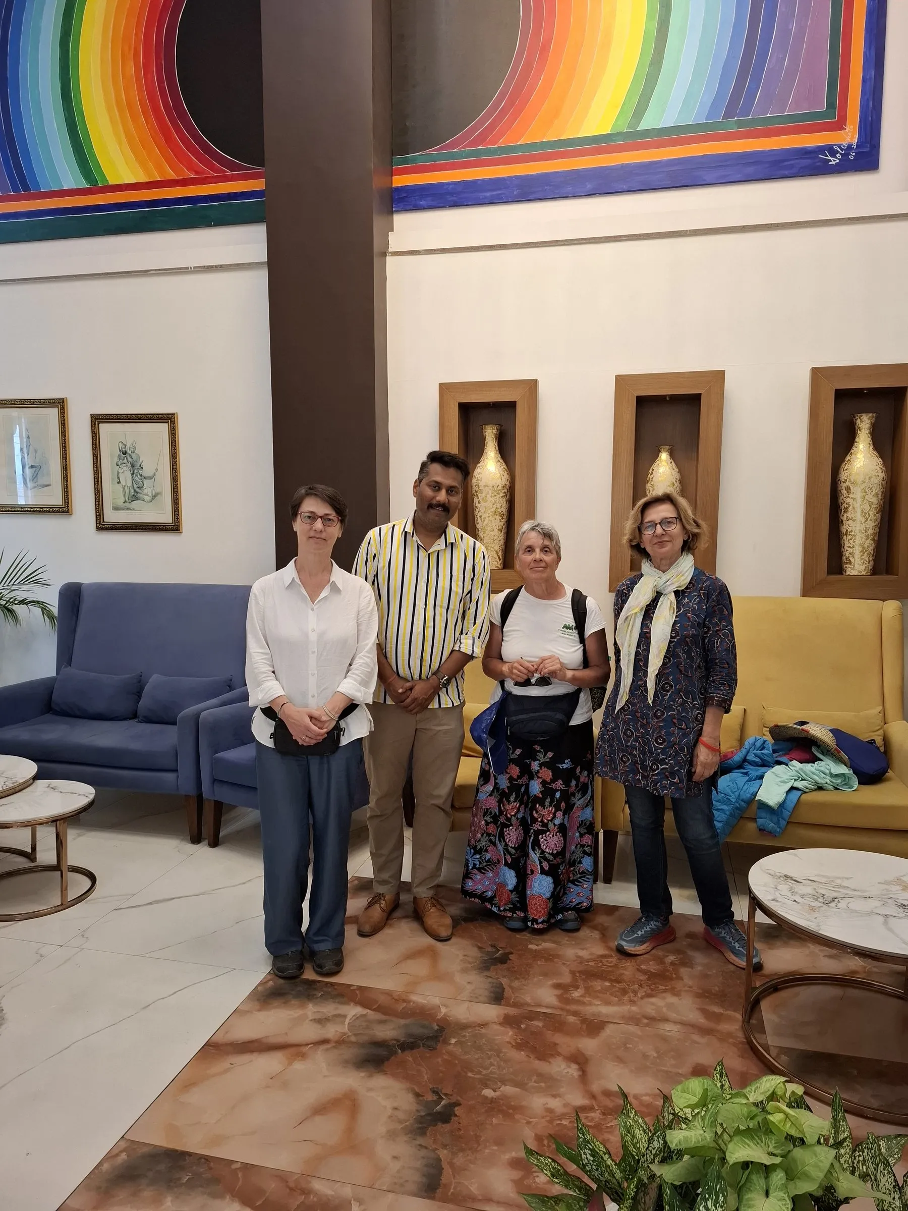 Travellers with the team in a hotel lobby