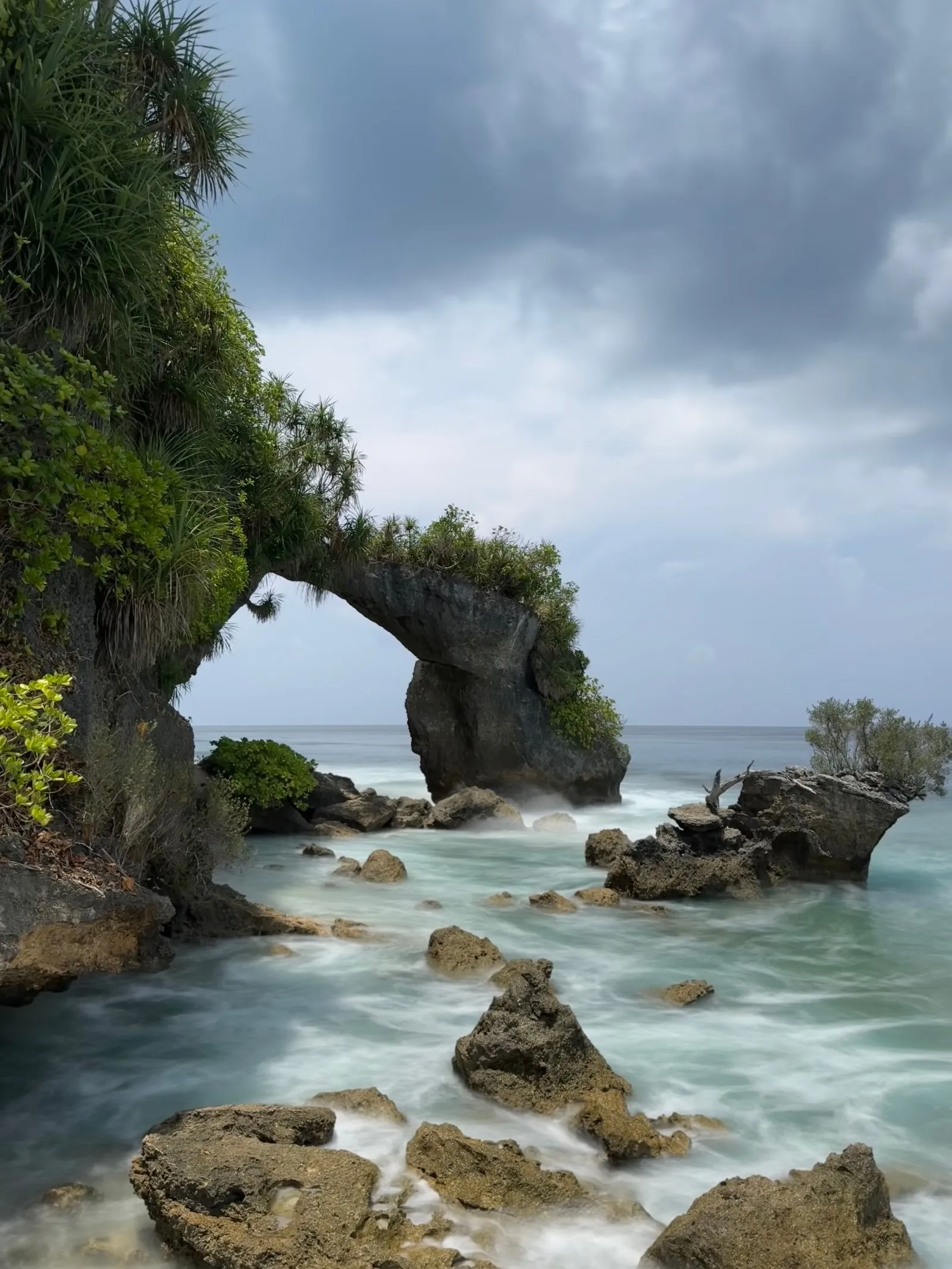 The natural rock arch at Lakshmanpur on Neil Island, the sea running through it