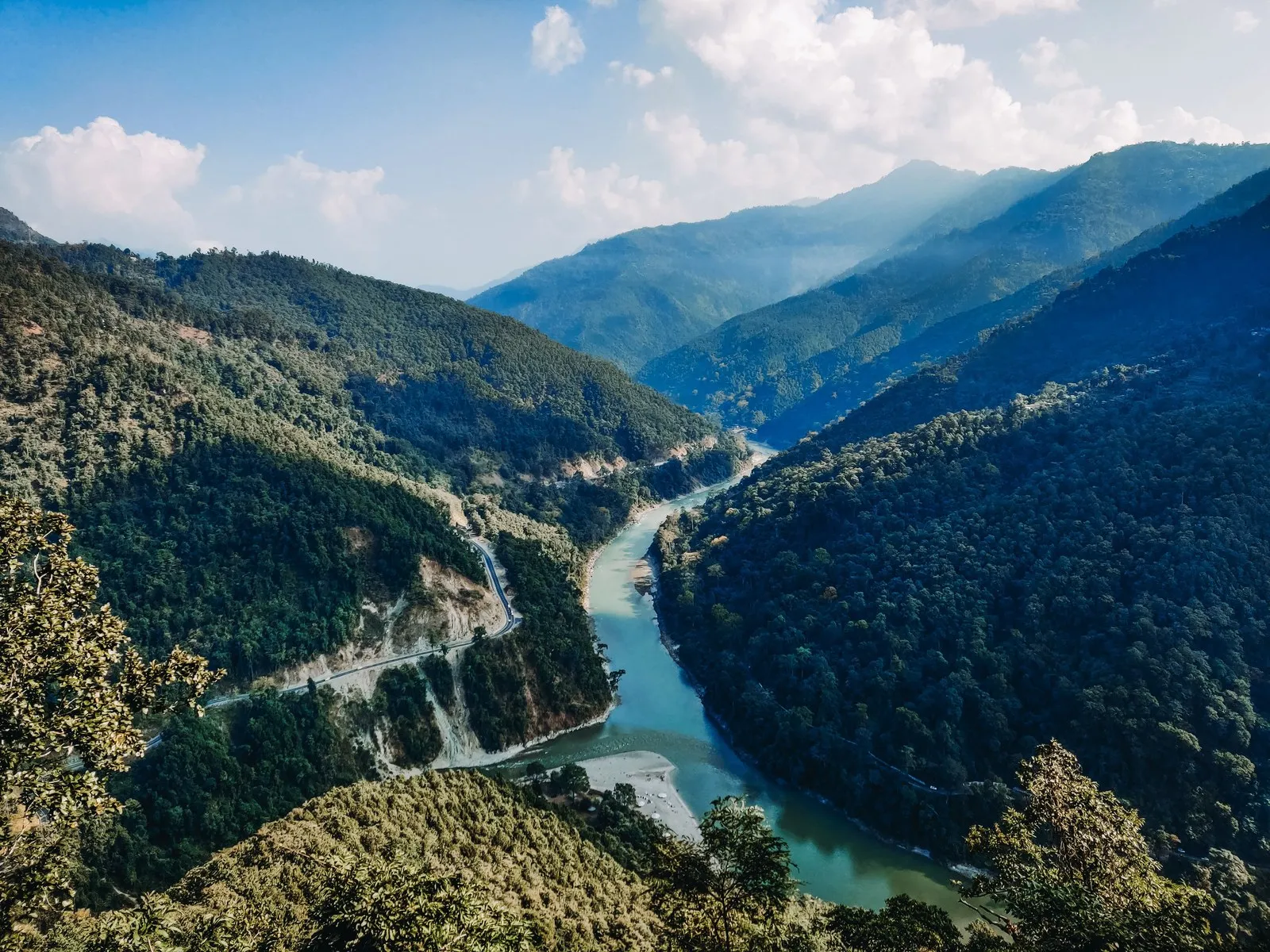 The Teesta winding through forested hills below Kalimpong