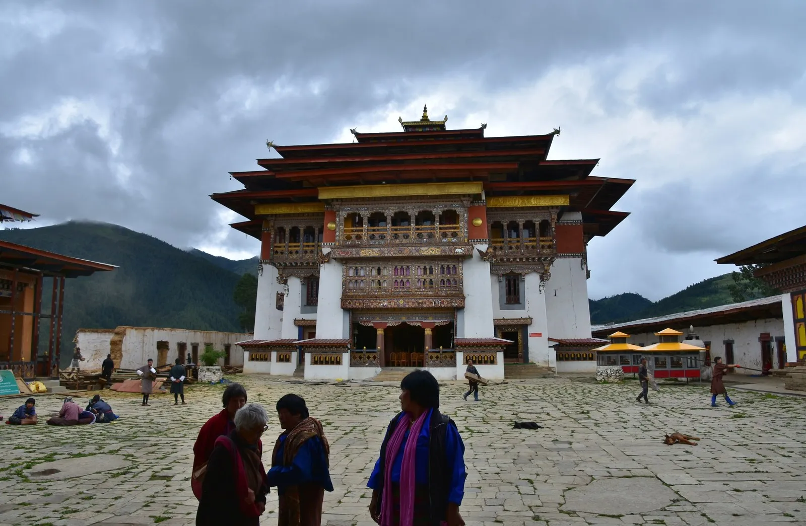 Gangtey Goemba above the Phobjikha valley, people crossing its courtyard