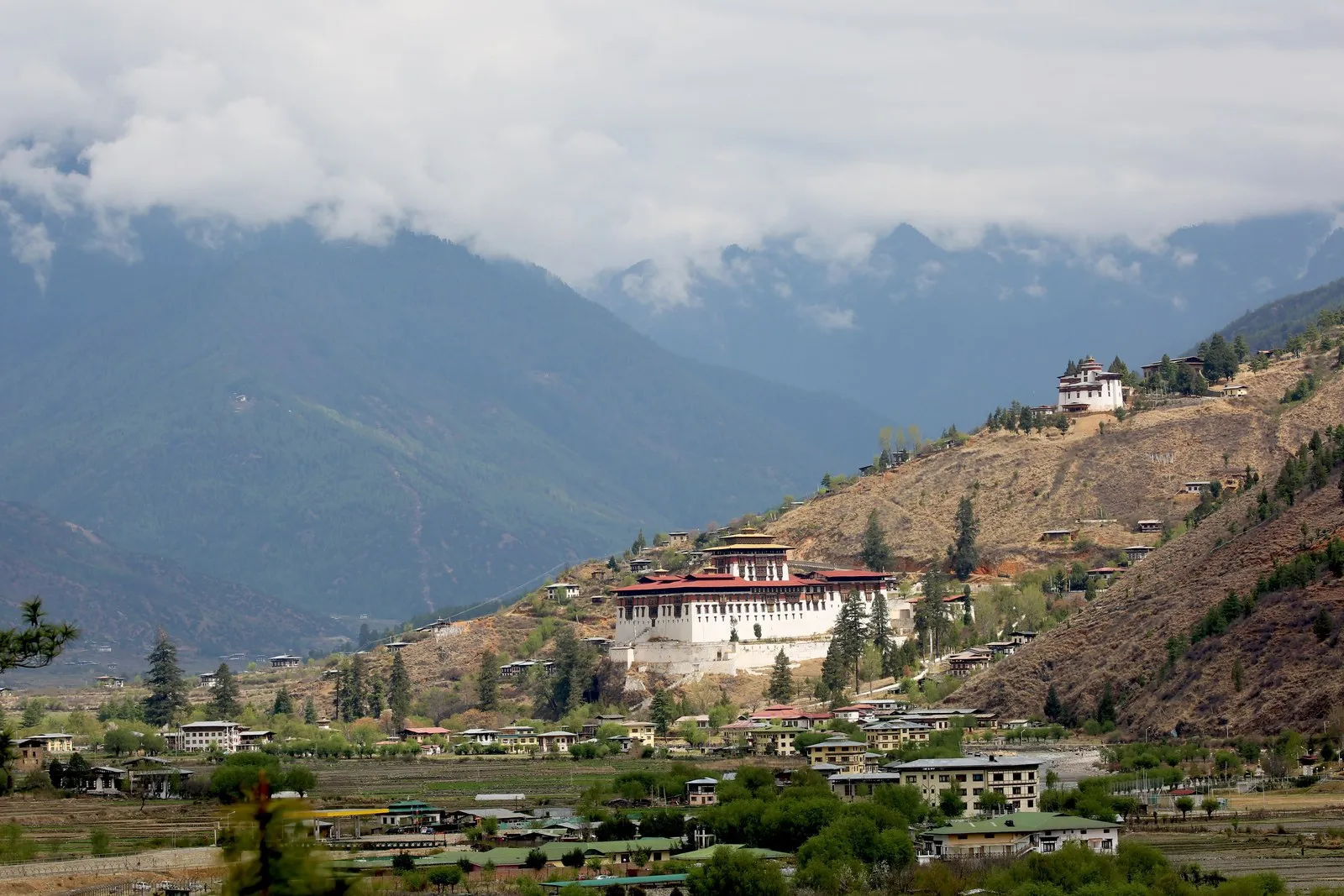 The Paro valley, Rinpung Dzong and the Ta Dzong watchtower above the town