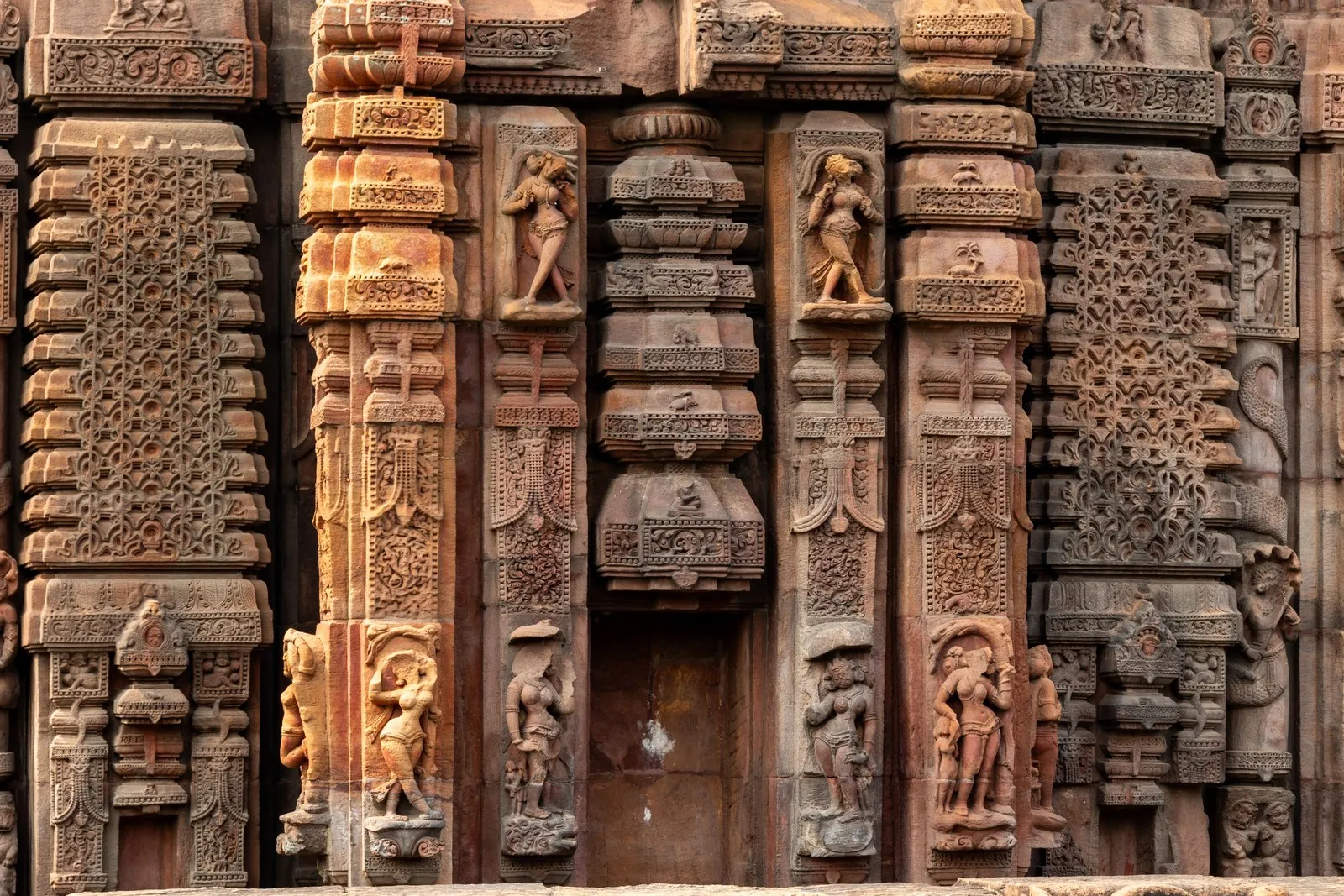 Carved sandstone on a temple wall in Bhubaneswar