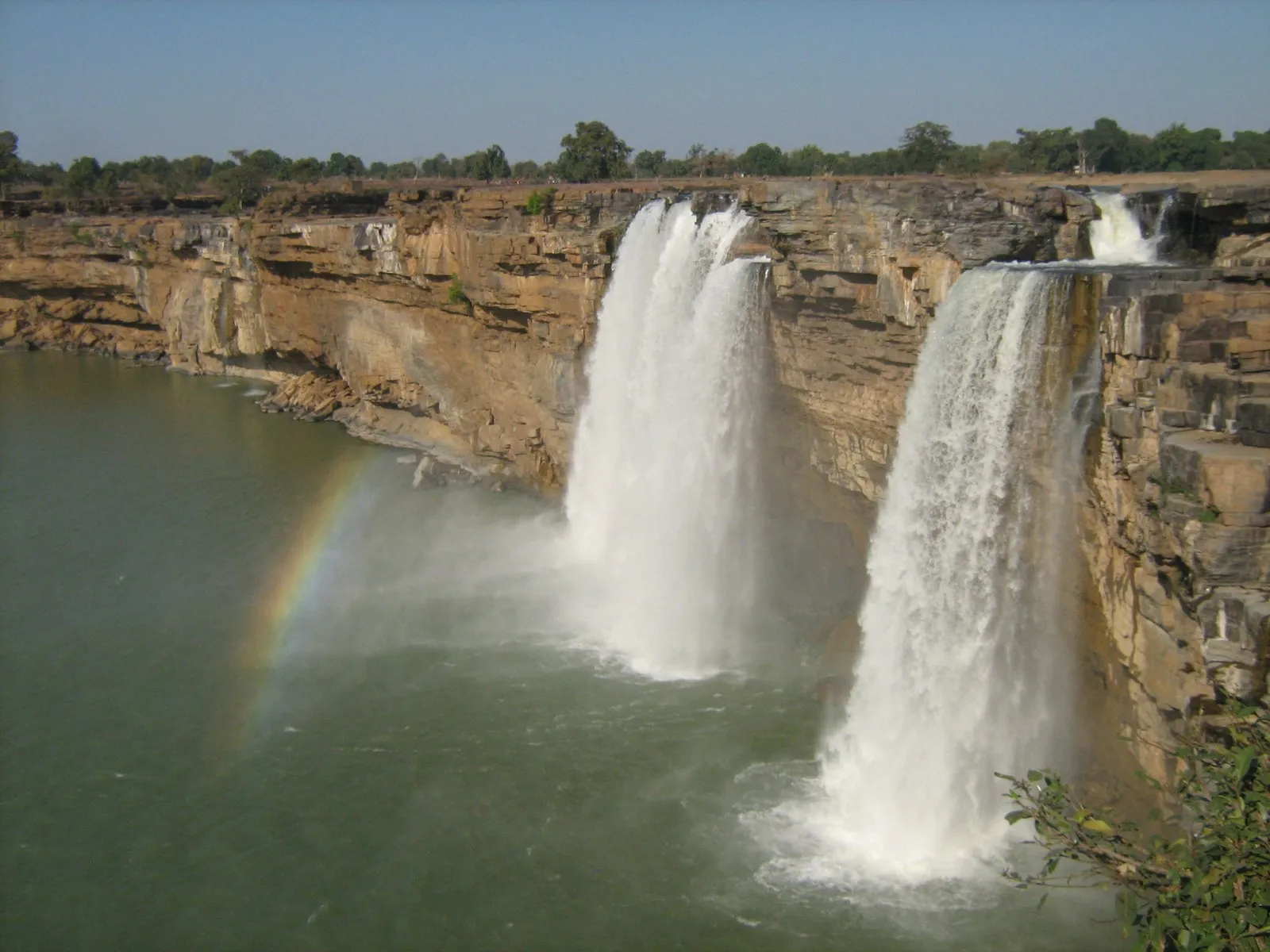The Chitrakote Falls on the Indravati, a rainbow in the spray, near Jagdalpur