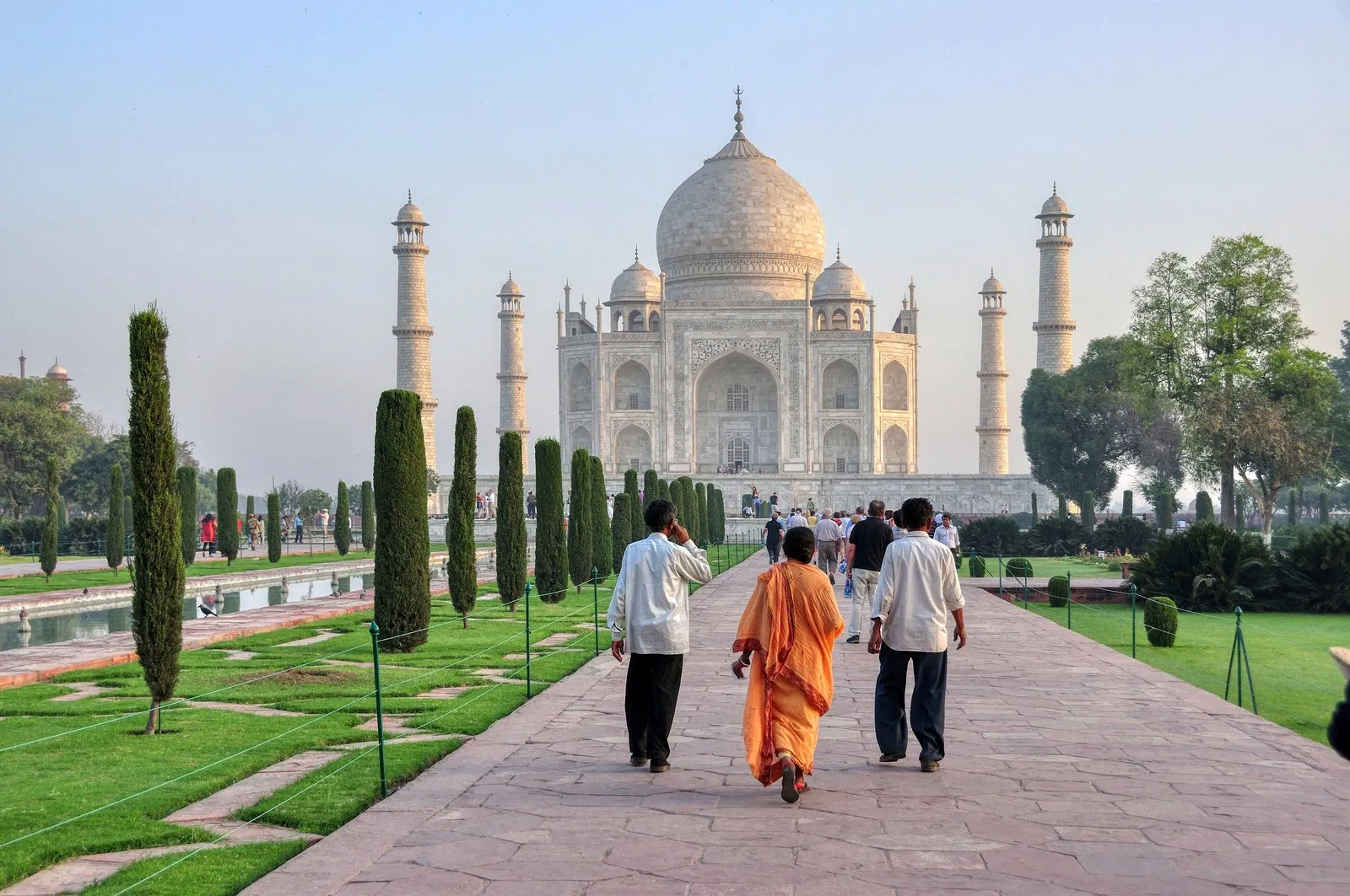 Visitors walking up the garden path to the Taj Mahal, Agra