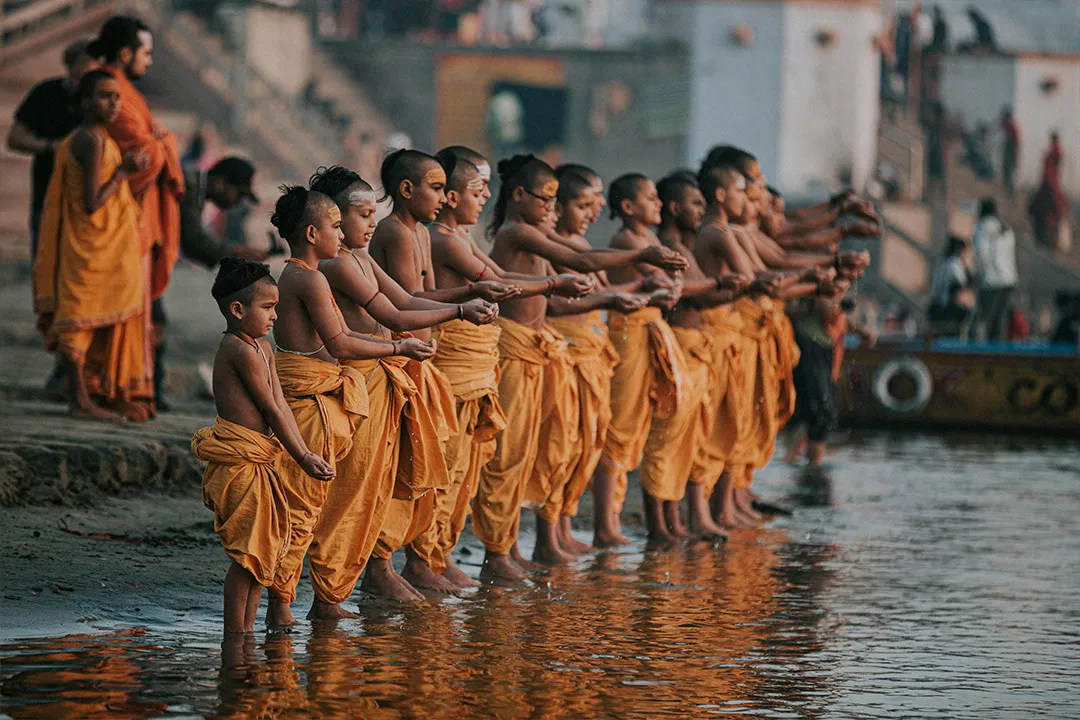 Monks standing in the Ganga at dawn