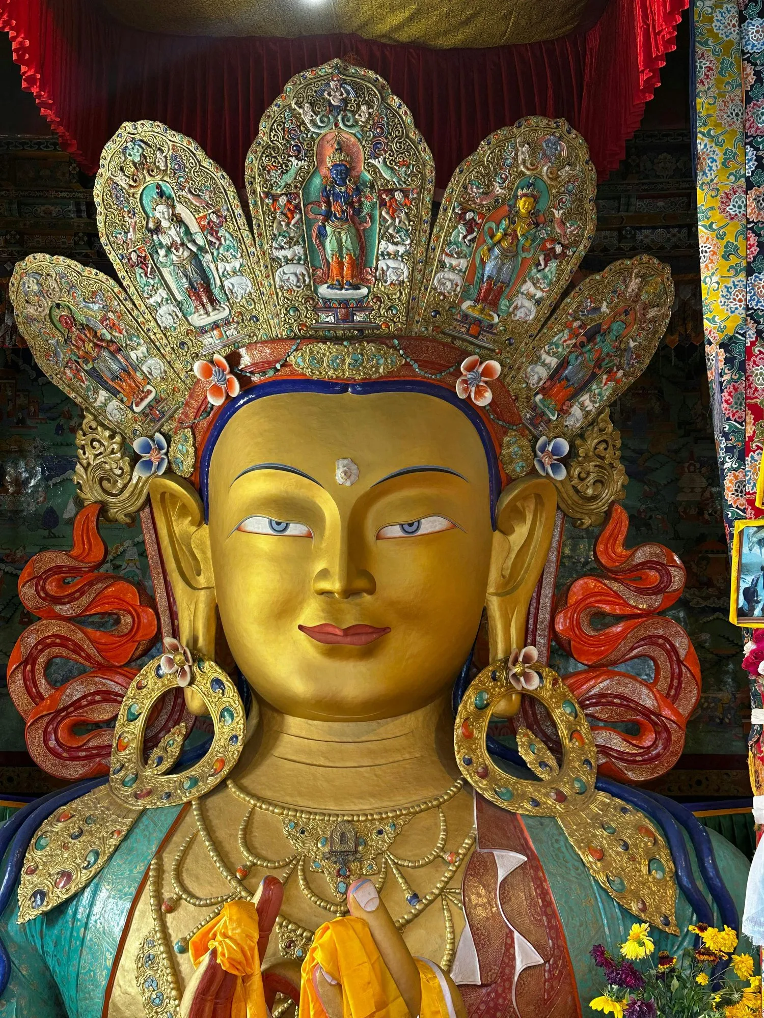 A gilded Maitreya Buddha with a jewelled crown