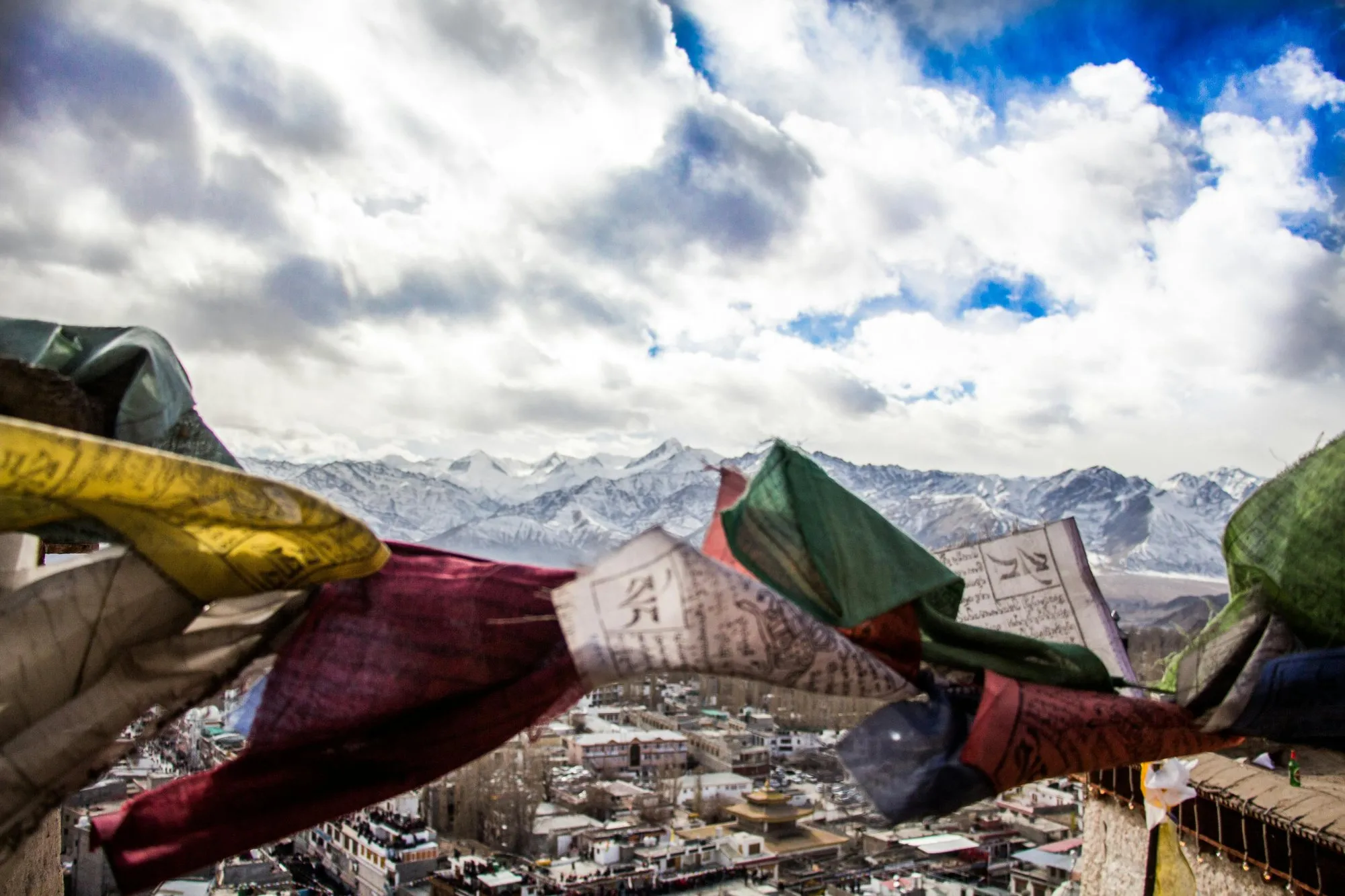 Prayer flags above Leh and the snow peaks
