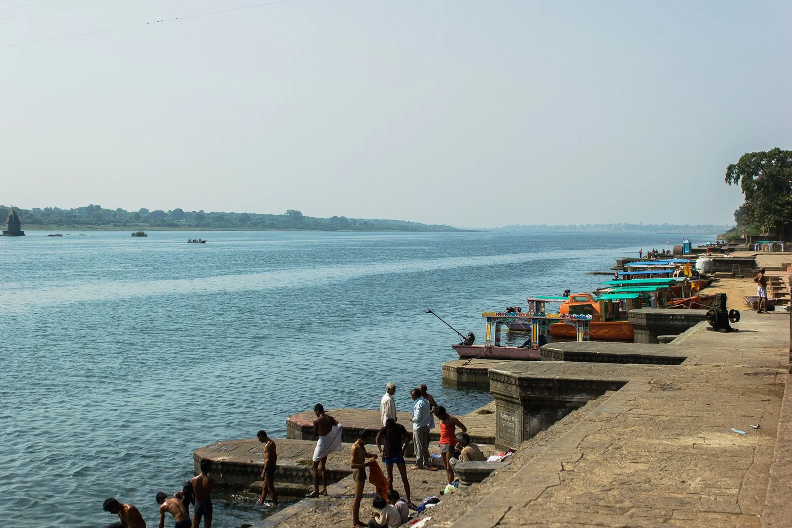 Bathers on the ghats of the Narmada at Maheshwar