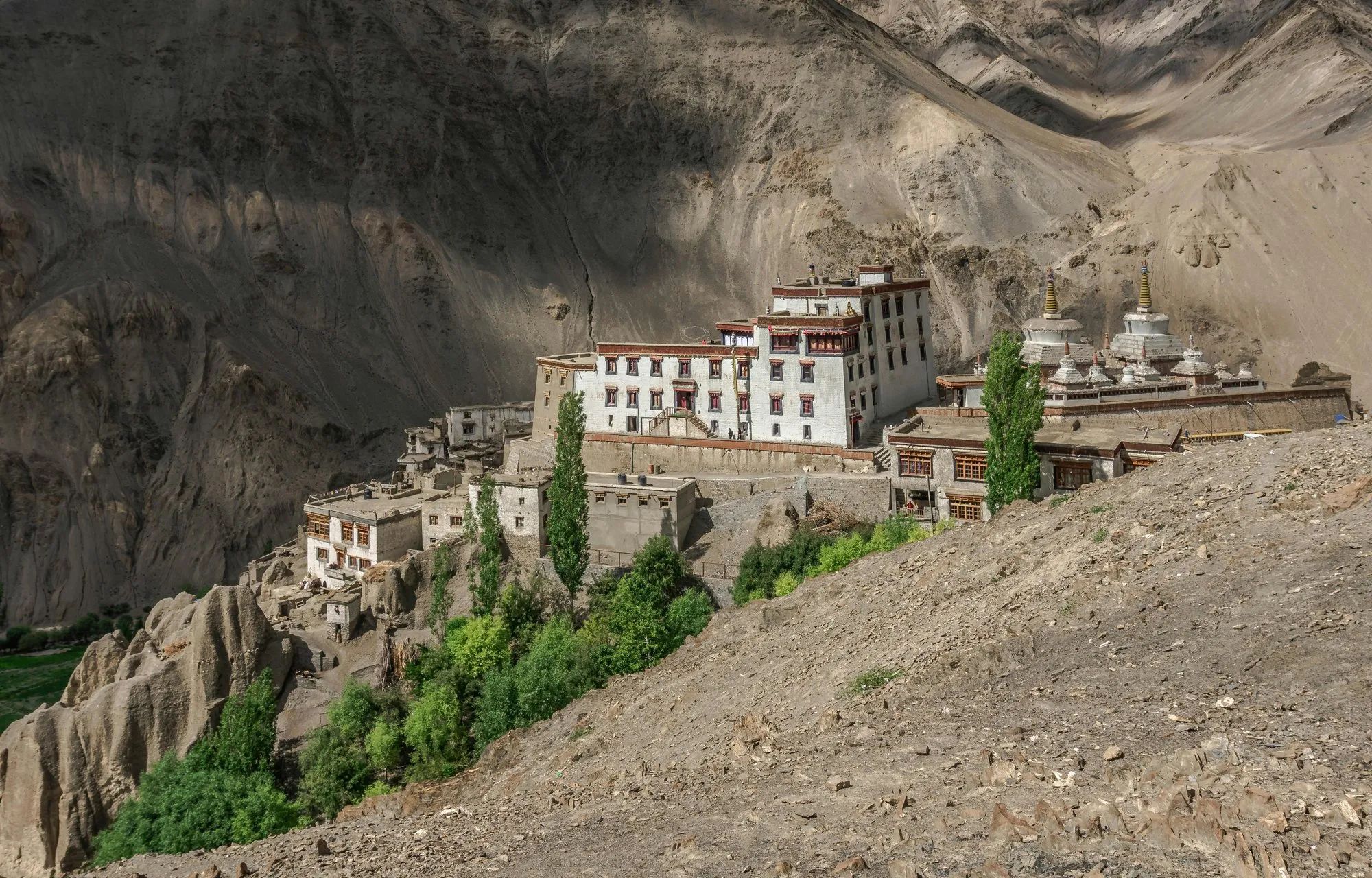 Lamayuru Monastery on its ridge above eroded hills