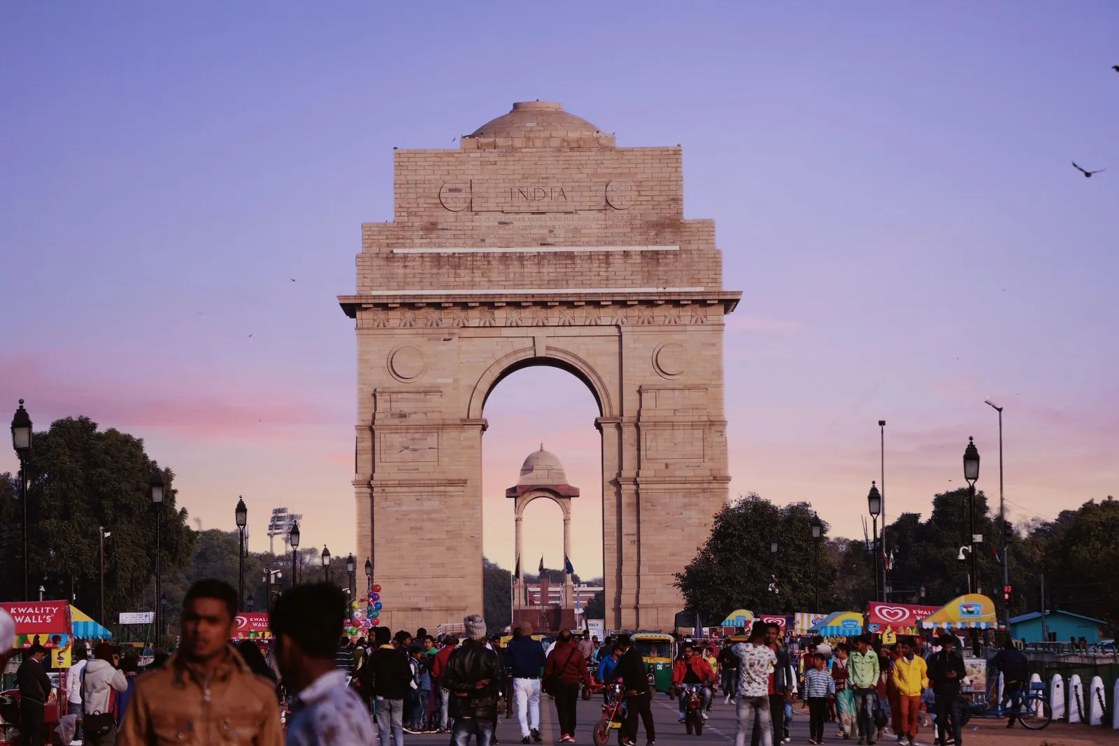 India Gate at dusk, New Delhi, with the evening crowd