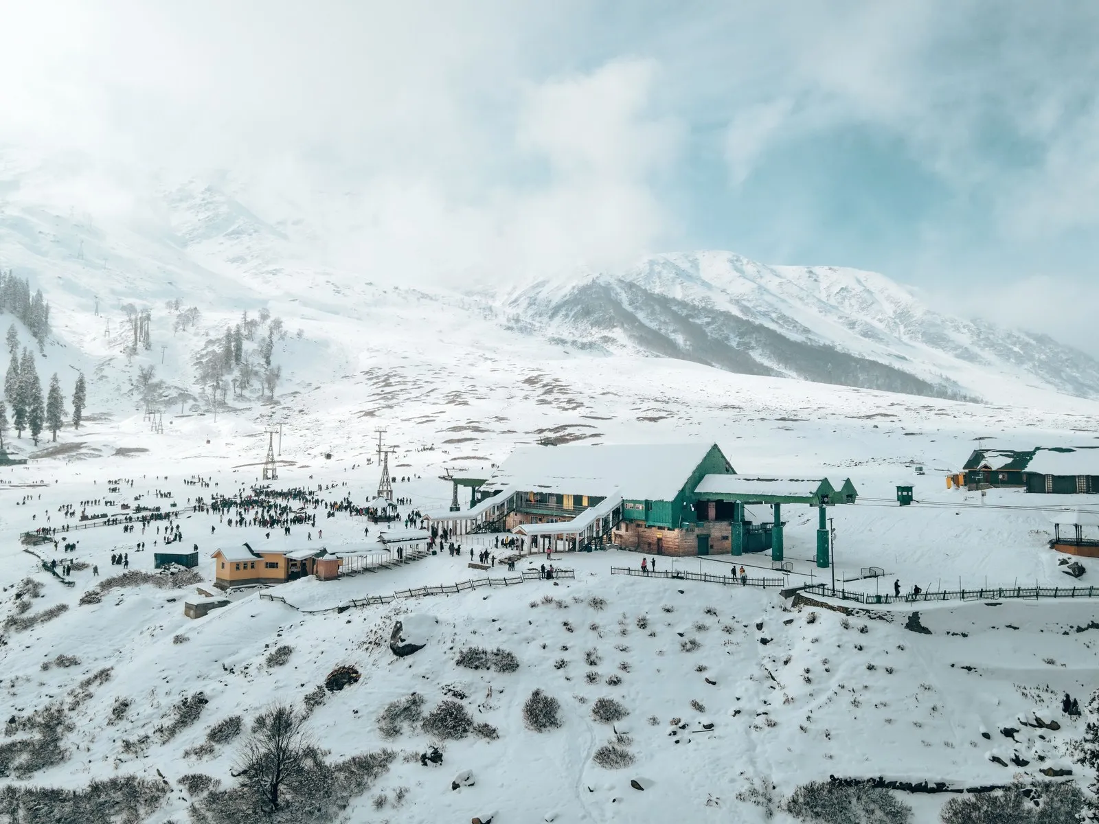 Gulmarg under snow from above, the gondola station and huts on the slope