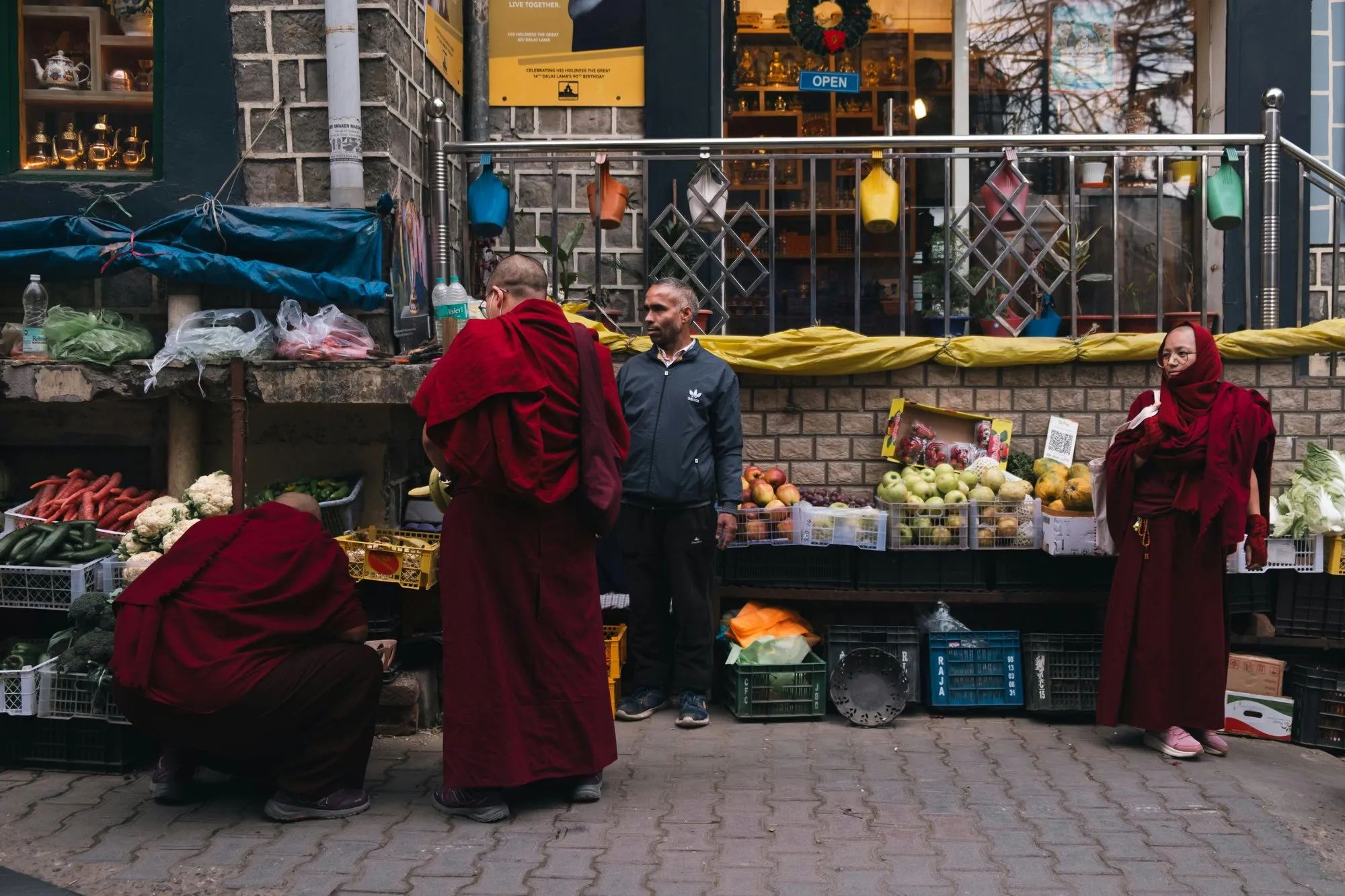 Monks at a fruit and vegetable stall in Leh