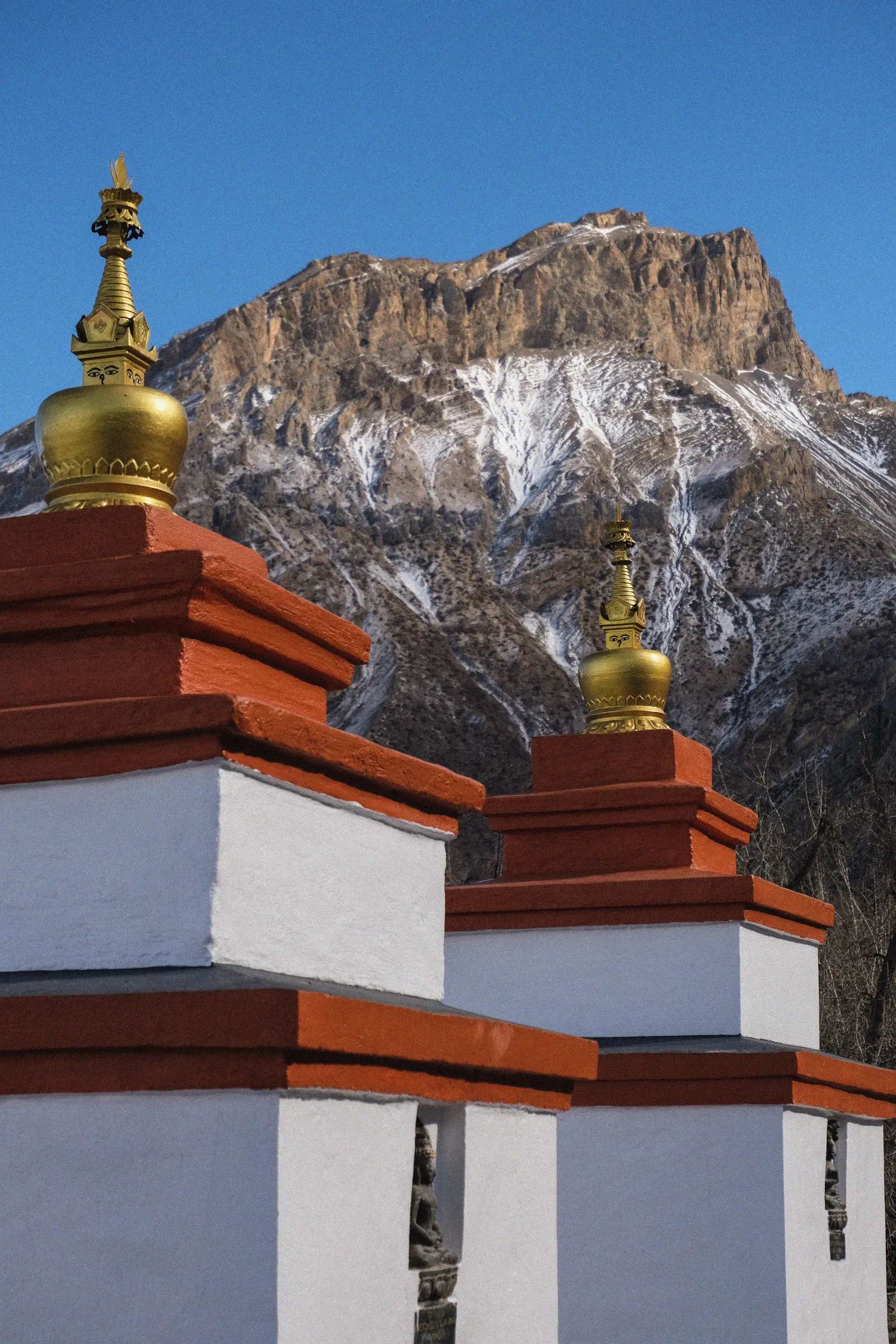 Two chortens with gilded spires at Muktinath