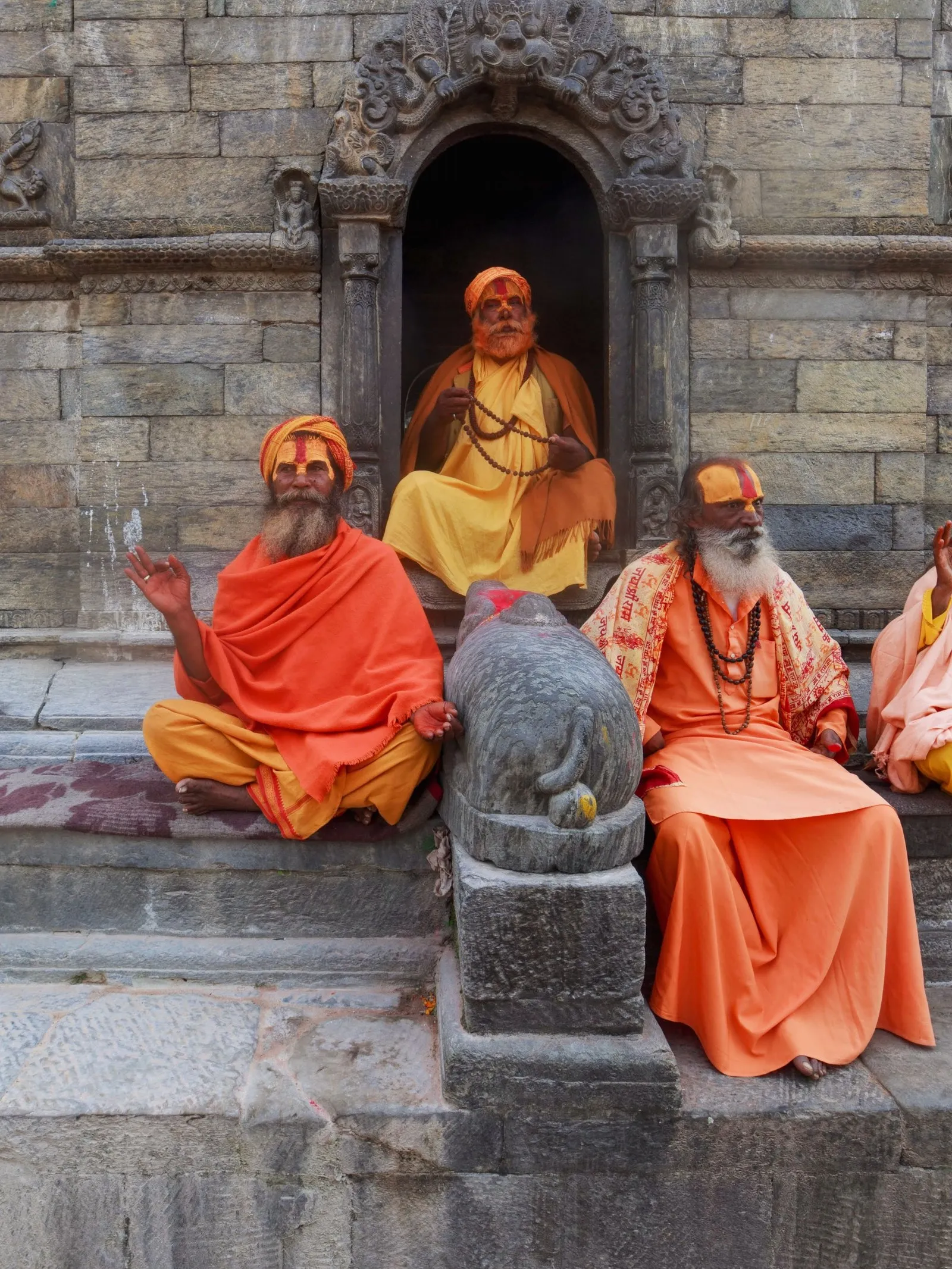 Sadhus in saffron at a shrine at Pashupatinath