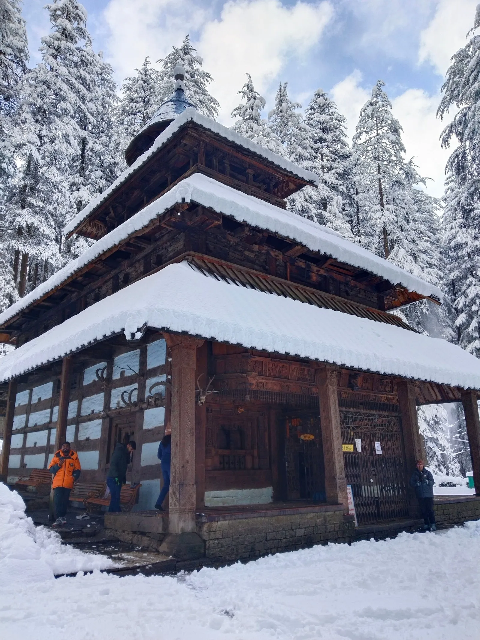 The Hadimba Devi temple under snow among the cedars, Manali