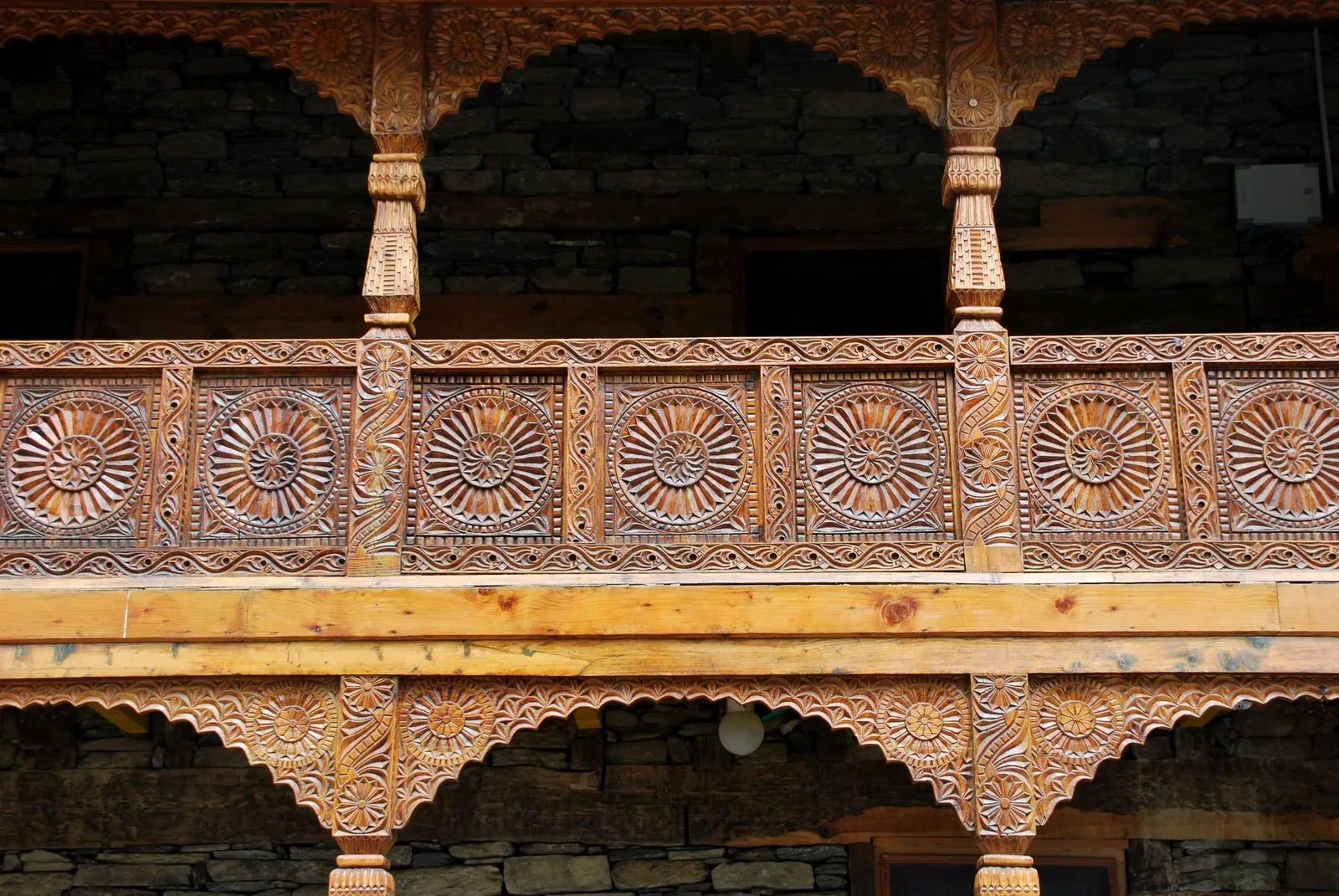 The carved wooden balcony of Naggar Castle in the Kullu valley