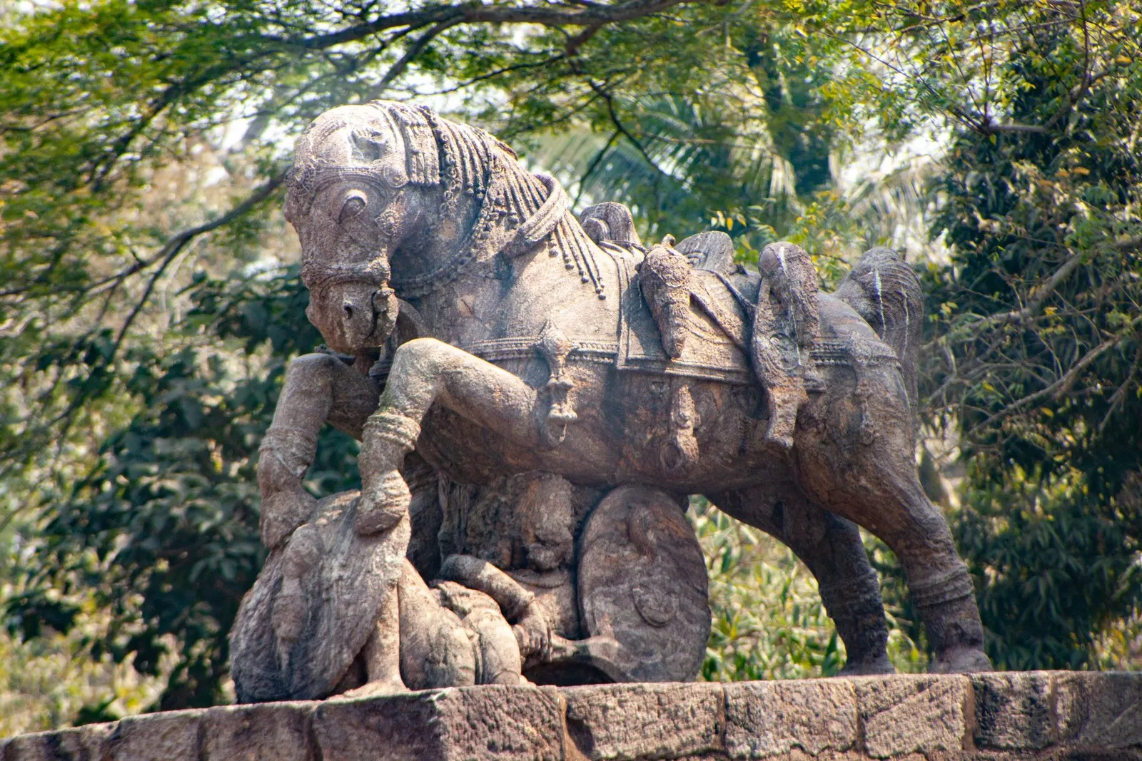The stone war horse beside the Sun Temple at Konark