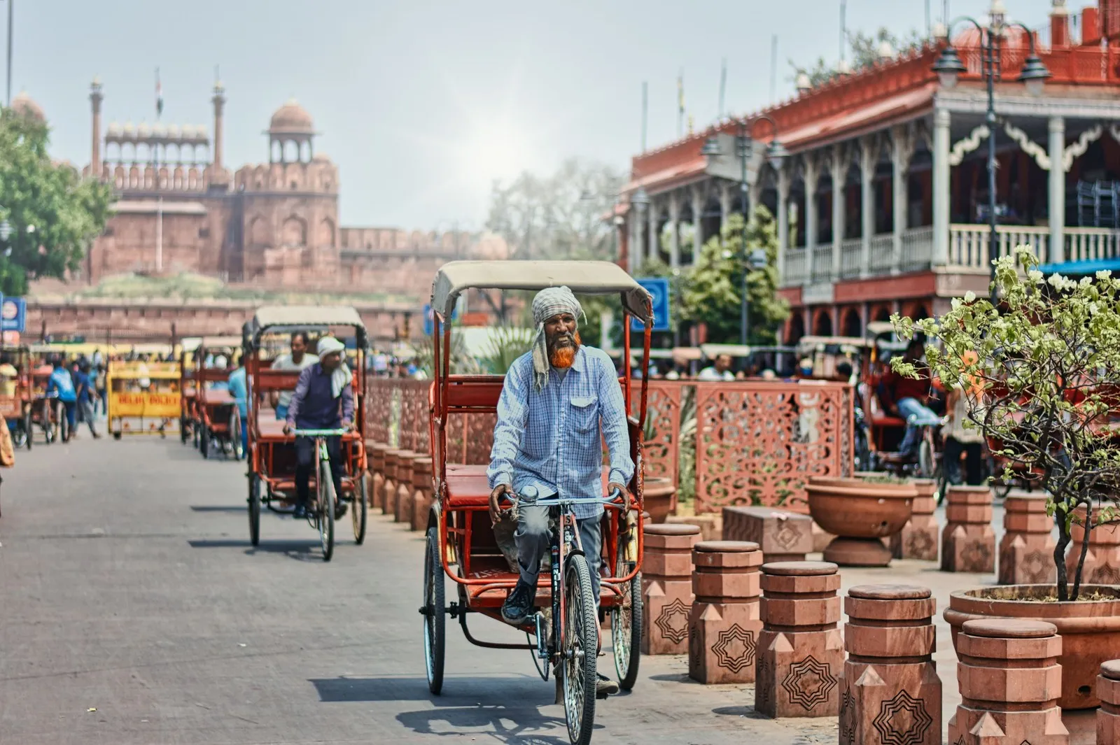 Cycle rickshaws near Chandni Chowk, the Red Fort behind