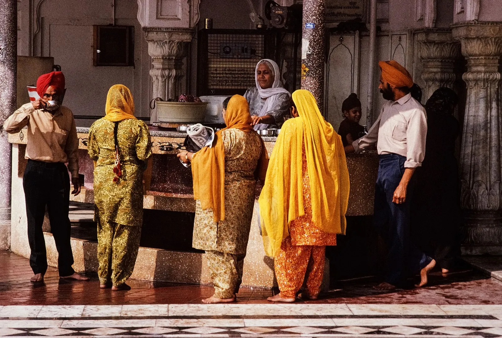 Pilgrims at a counter inside the Golden Temple complex, Amritsar