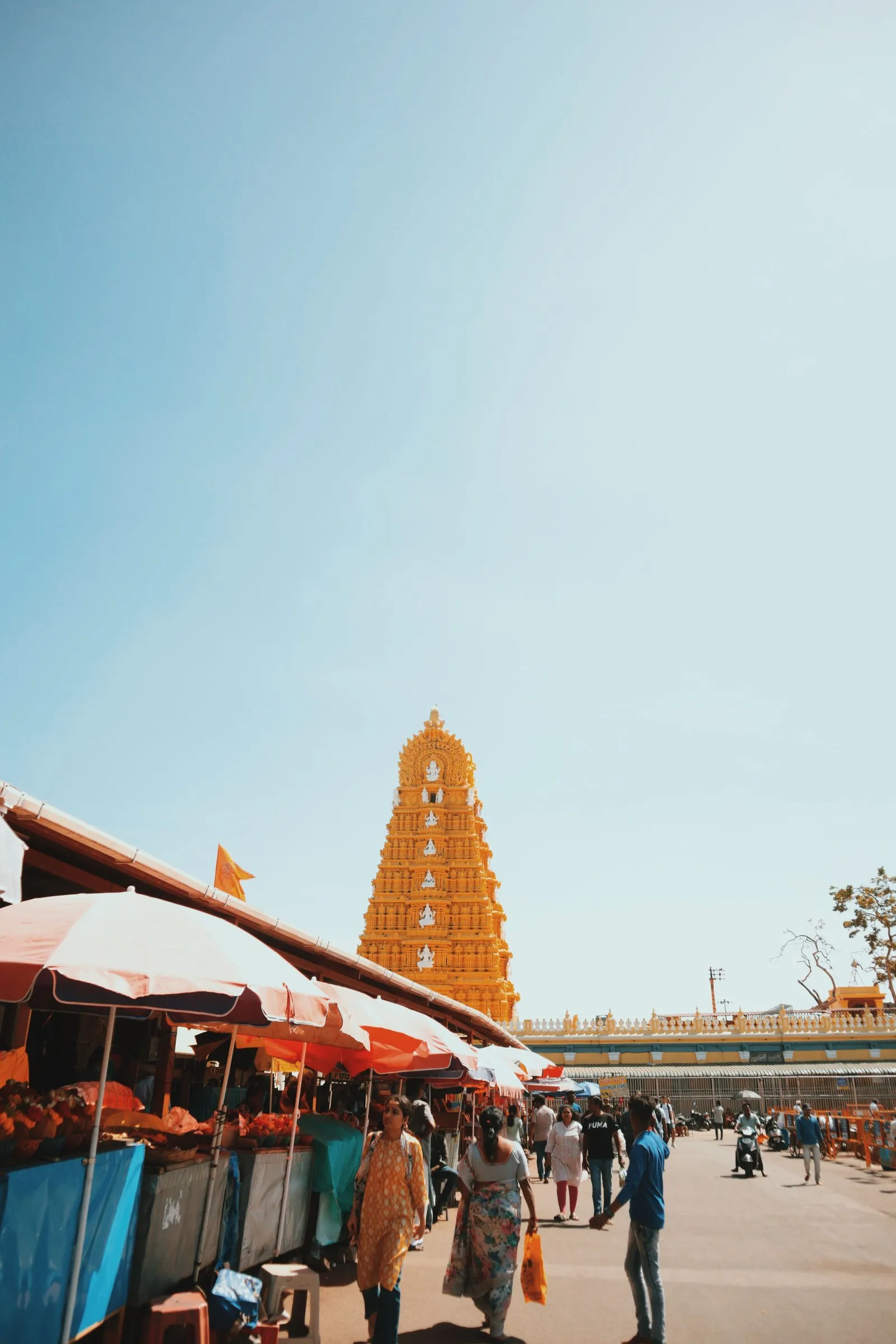 Stalls below the gopuram of the Chamundeshwari temple on Chamundi Hill, Mysore