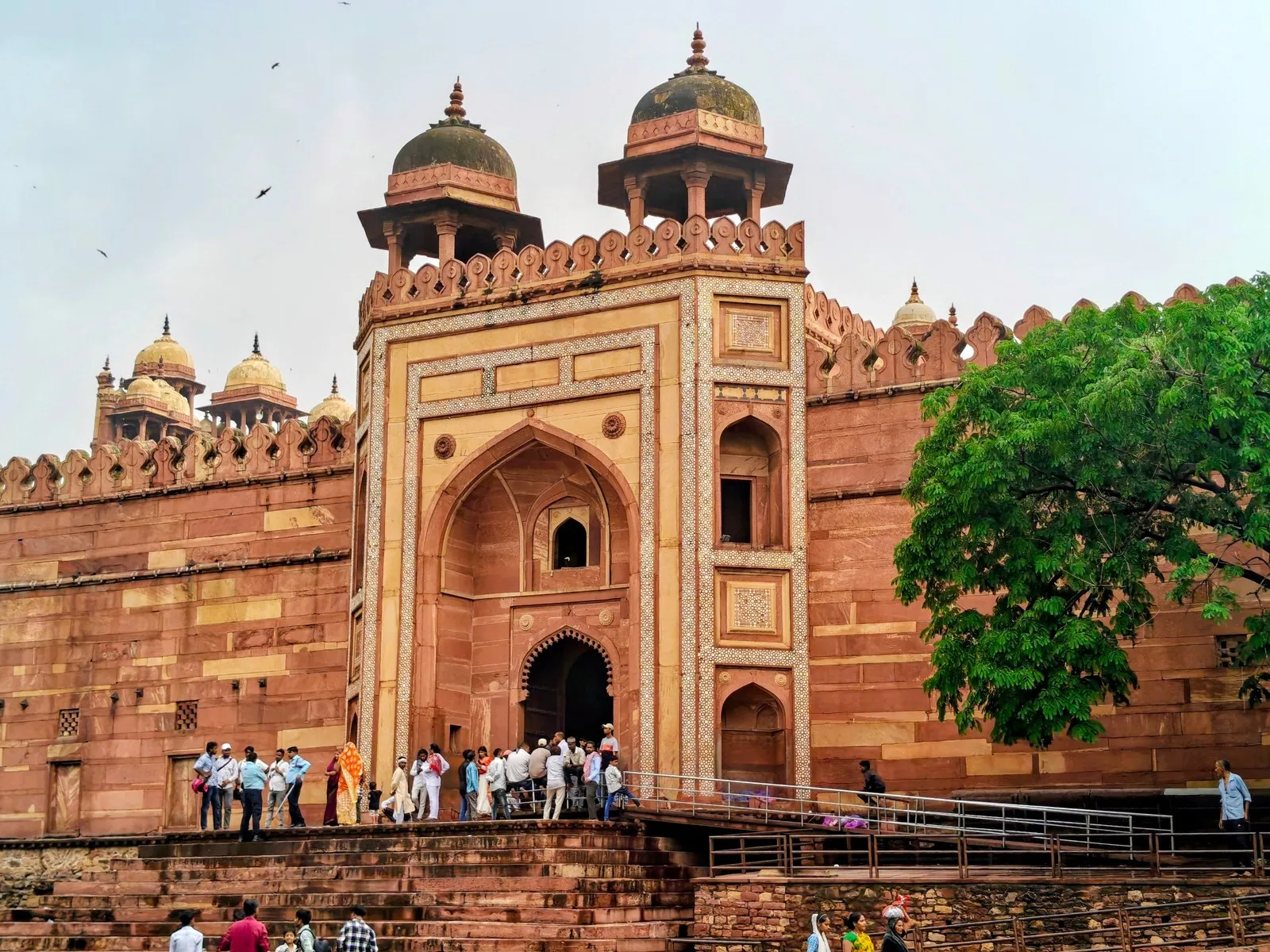 Visitors on the steps below the Buland Darwaza at Fatehpur Sikri