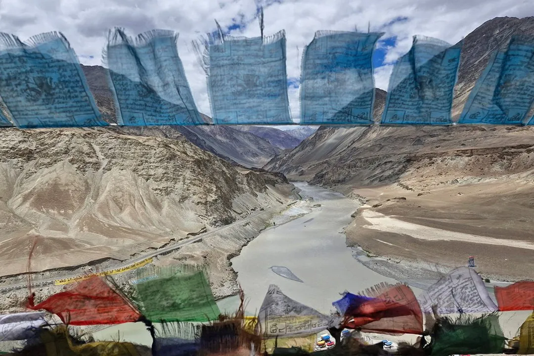 Prayer flags above the meeting of the Indus and the Zanskar