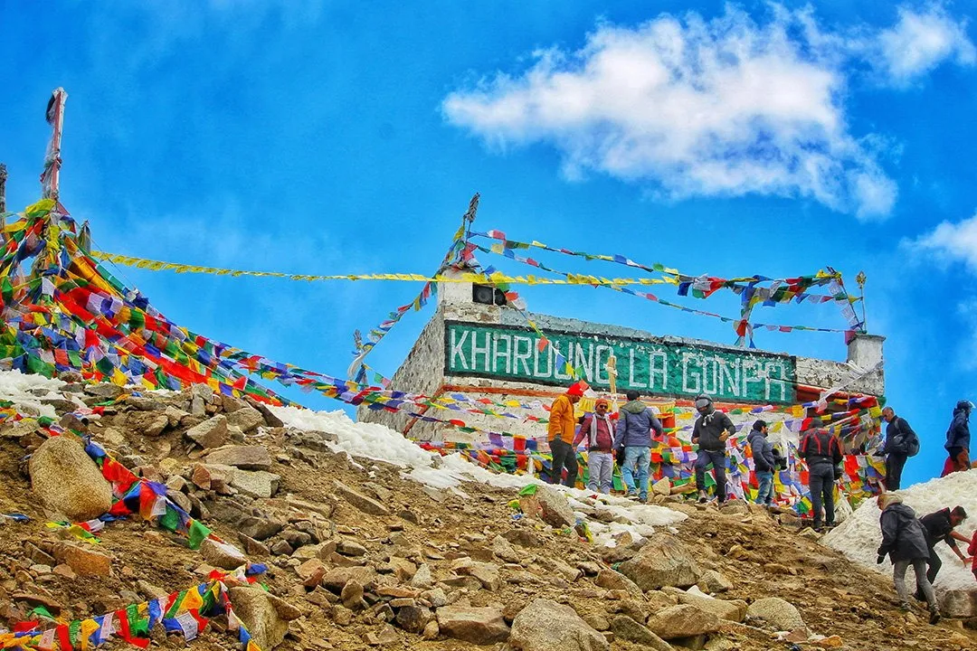 Prayer flags at the top of Khardung La