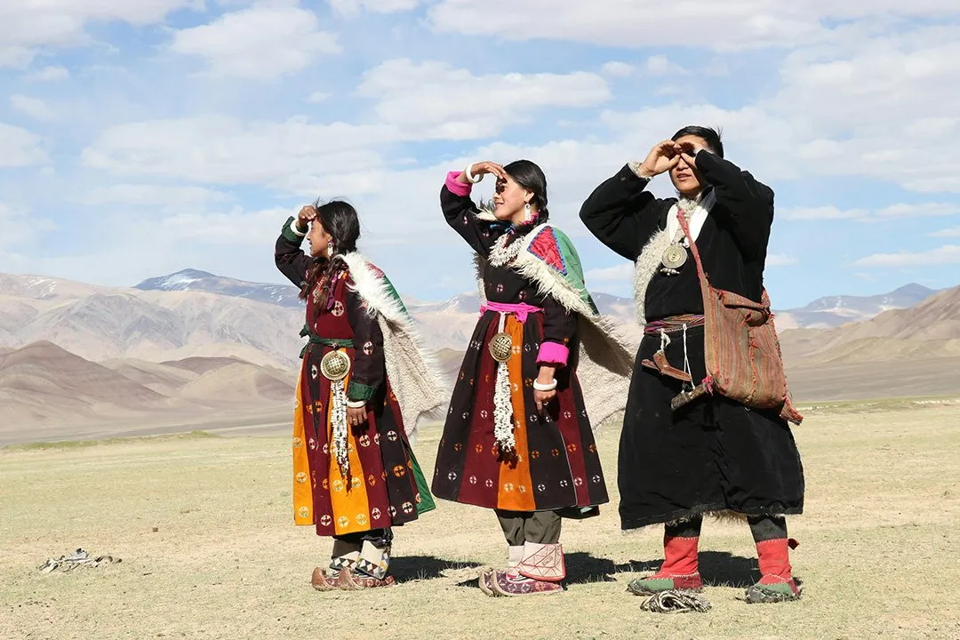 Three Ladakhi women in traditional dress