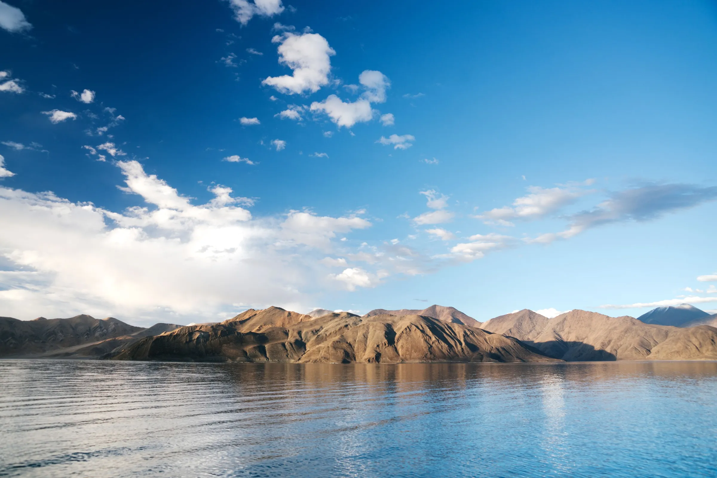 Pangong Tso, the bare hills standing in its water
